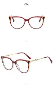 Chic oversized cat-eye glasses with chic tortoiseshell red frames and cute gold heart temples.