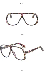 Occhiali da sole retro oversize effetto tartaruga moda streetwear chic per donna e uomo.