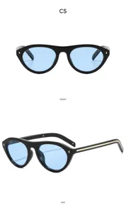 Lunettes de soleil ovales rétro œil-de-chat tendance avec verres bleu clair et monture noire.