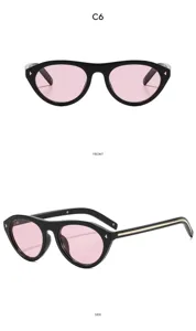 Lunettes de soleil œil-de-chat tendance pour femme, monture noire rétro, verres roses.
