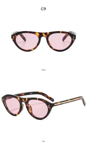 Vue détaillée de lunettes de soleil œil-de-chat écaille rétro avec verres roses et métal.
