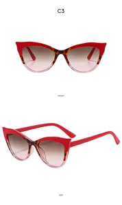 Detailed view of trendy Y2K cat-eye sunglasses featuring a bold red and leopard print frame.