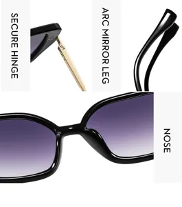 Nahaufnahme von Vintage-Sonnenbrillen in Schwarz mit quadratischen, violetten Gläsern.