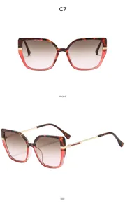 Detailansicht der Vintage-Cat-Eye-Sonnenbrille mit Farbverlauf-Rahmen und schlanken Metallbügeln.