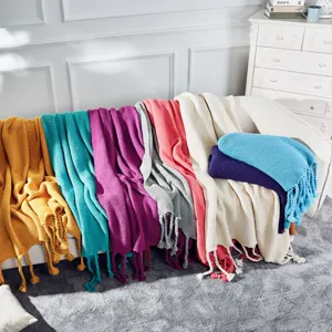 Nordische einfarbige gestrickte Quasten-Wohndecke fuer Sofa und Bett im Schlafzimmer.