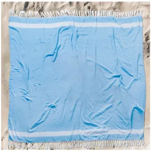 Light blue Turkish cotton beach towel with white stripes and fringe detail for summer.