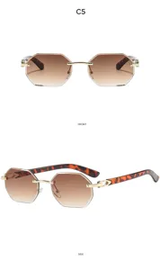 Chic rimless polygonal sunglasses with gradient brown lenses and tortoiseshell temples.