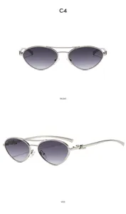 Occhiali da sole cat eye con doppio ponte in metallo vista dettagliata, accessorio chic.