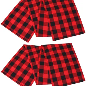 Red and black buffalo plaid table runner, classic checkered fabric for home decor.