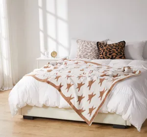 Cozy fleece star blanket with soft texture, perfect bedroom decor and warm throw for bed.