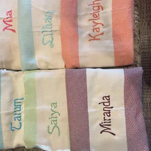 Custom embroidered Turkish beach towel woven cotton blanket with fringe stripes detail view.