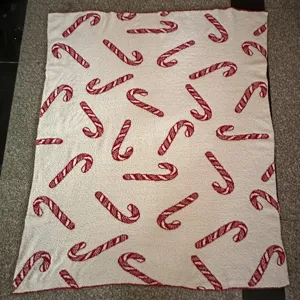 Knitted Christmas candy cane throw blanket, soft plush fuzzy jacquard blanket for home.
