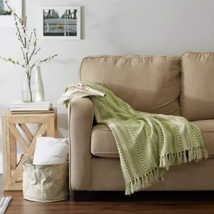 Plaid de canape tassele jacquard tisse pour salon lit, couverture decorative verte.