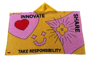 Woven hooded blanket throw poncho with custom knit heart and flower pattern for daily use.