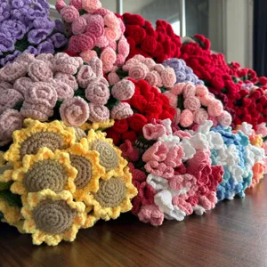 Handmade crochet flower bouquet detailed shot, vibrant multi-color knitted rose and sunflower.