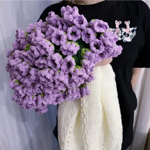 Handmade crochet purple flower blanket detail shot, exquisite yarn craft and cozy texture.