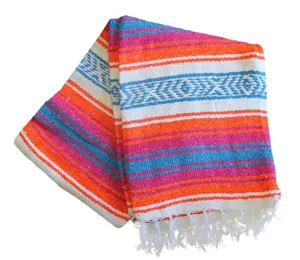Mexican style woven blanket with geometric stripes and fringe for beach picnic home decor.