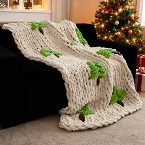 Handmade chunky knit blanket with Christmas tree pattern, cozy chenille throw for sofa living room decor.