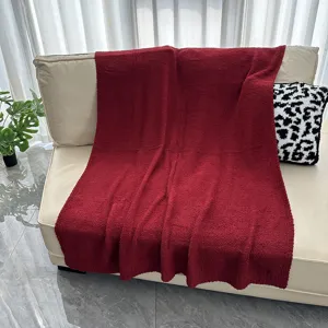 Cozy dark red plush blanket for sofa, soft fuzzy throw blanket for winter warmth and home decor.