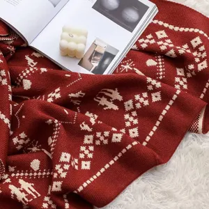 Red Christmas knitted jacquard blanket detail, cozy winter sofa throw blanket for holiday decor.