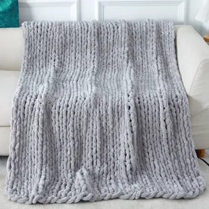 Chunky chenille knit blanket detail, soft handmade throw blanket for cozy sofa and home decor.