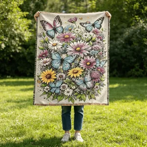 Woven jacquard throw blanket featuring vibrant butterflies and floral design for home decor.