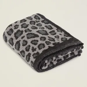 Mancia coperta leopardata in maglia morbido peluche motivo jacquard dettaglio