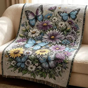 Woven blanket throw with butterfly and flower design for living room sofa decor.