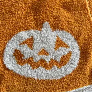 Orange white fleece blanket pumpkin jacquard throw soft cozy fuzzy couch bed blanket textile.