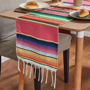 Mexican style colorful striped table runner with fringe for party dining table decoration.