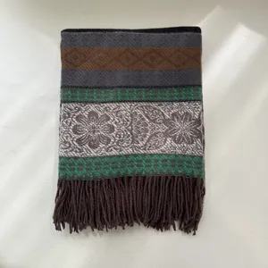 Detail view of the vintage boho ethnic striped tassel shawl, showcasing rich textured woven patterns.