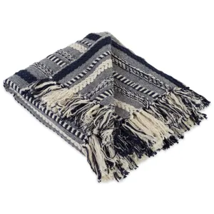 Détail de couverture plaid tissé jacquard avec franges, douce couverture en coton pour lit et canapé.