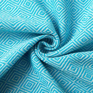 Turkse geweven jacquard strandhanddoek en zachte deken met ruitjespatroon detail.
