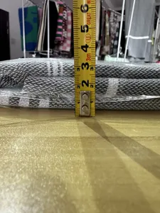 Detailed view showing the folded thickness and woven striped texture of the Turkish beach towel.