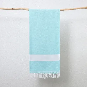 Turks jacquard stranddeken detail, geweven katoenen linnen badhanddoek met franje decoratie.