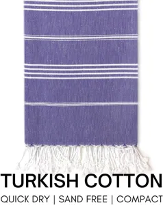 Turkish cotton beach towel with striped pattern and fringe, quick dry and compact.