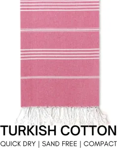 Turkish cotton beach towel with pink stripes and fringe detail, quick dry and sand free.