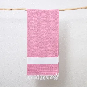 Roze witte ruit jacquard Turkse strandlaken katoenen geweven deken kwastje detail.