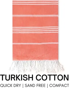 Detailed view of Turkish cotton beach towel with white stripes and tassels, quick dry.