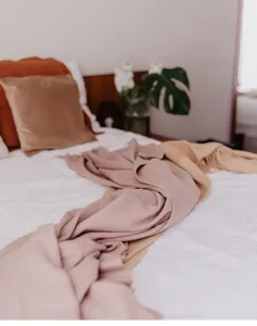 Cozy merino wool throw blanket for bedroom and living room, soft knit warm bed cover.