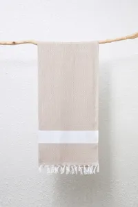 Gedetailleerd overzicht van een geweven jacquard Turks handdoek met prachtig ruitpatroon.