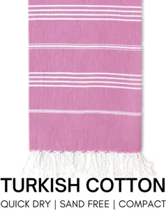 Turkish cotton beach towel with pink stripes and fringe, quick dry, sand free, compact.
