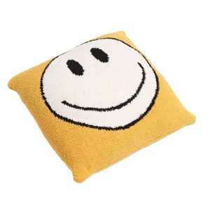 Yellow fluffy knitted throw pillow cover with cute black and white smiley face design for sofa.