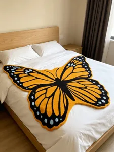 Monarch butterfly shaped fleece blanket, soft cozy throw rug for bedroom bed and sofa decor.