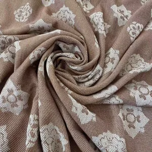 Brown jacquard cooling blanket fabric texture detail showing soft cozy summer quilt material.