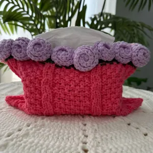 Handmade crochet tissue box cover with purple roses, pink knitted holder, detail home decor display.