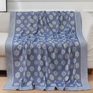 Blue and white woven floral throw blanket for sofa, comfortable air conditioning nap cover.