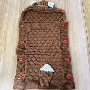 Baby knitted sleeping bag with cute animal ears and tail, cozy swaddle blanket for infants.