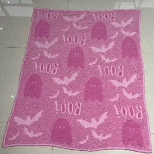 Pink Halloween ghost and bat pattern knit throw blanket, soft plush flannel material.