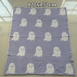 Cozy knit ghost blanket featuring cute pattern jacquard design, soft fleece material for autumn.